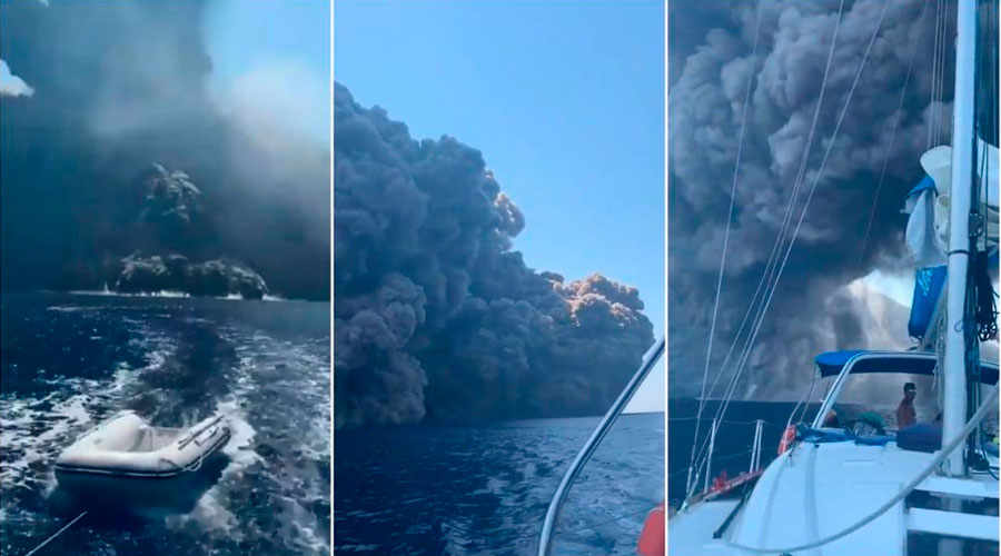 Un barco huye de una enorme ola de humo tras la erupción del volcán Estrómboli