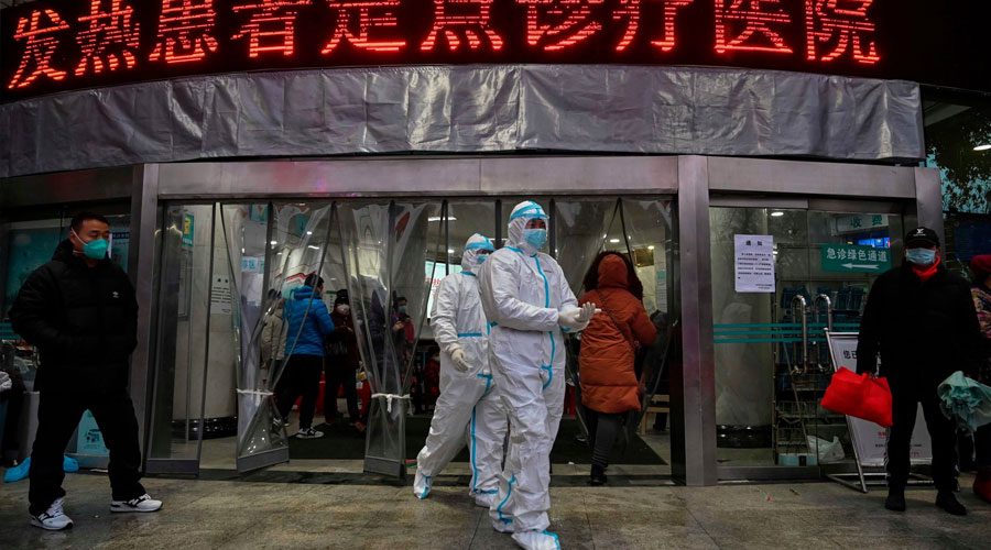 Empleados discutieron con guardias al no aguantar cuarentena en China